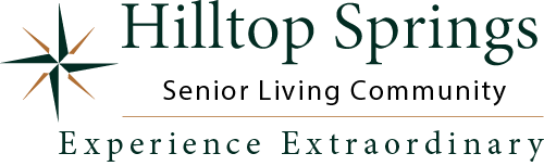 Logo of Hilltop Springs Senior Living Community with a star emblem. Text reads: “Experience Extraordinary.”.