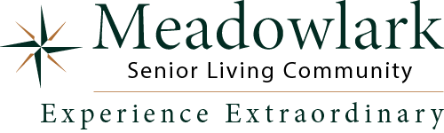 Logo for Meadowlark Senior Living Community. A stylized compass rose is on the left, followed by the text "Meadowlark" above "Senior Living Community." Beneath, the slogan reads "Experience Extraordinary" in italics.