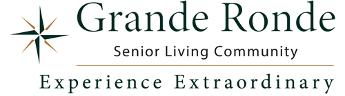 Logo for Grande Ronde Senior Living Community with a green and orange compass rose and the words “Experience Extraordinary” below.